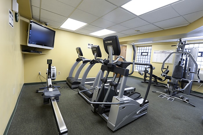 Fairfax fitness room - tv weight equipment and cardio machines